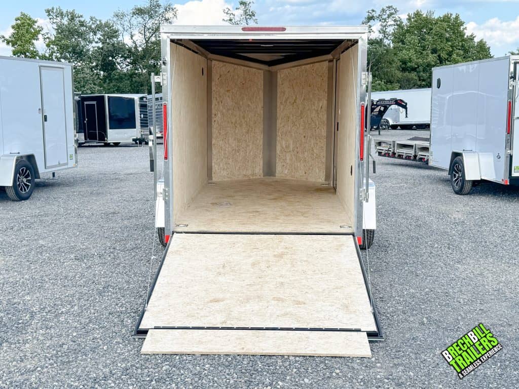 Enclosed cargo trailer rear open ramp door