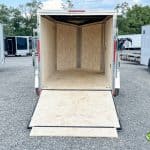Enclosed cargo trailer rear open ramp door